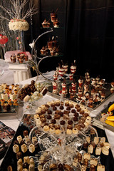 Colorful desserts and pastry served on a wedding party