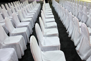 Rows of white chairs