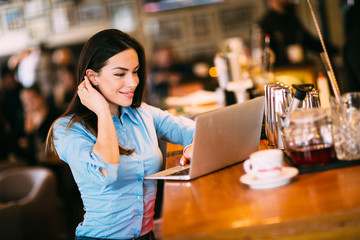 Business woman using laptop