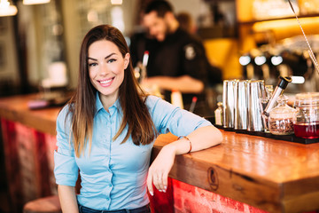 Pretty girl at cafe posing