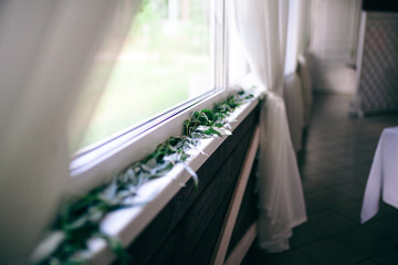 green leaves as decoration for a wedding