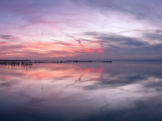 golden and red skies above the pobles del sud near valencia in spain on a crisp beautiful winter evening