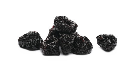 Prunes, dry plums pile isolated on white background