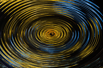 Yellow and blue spiral whirlpool