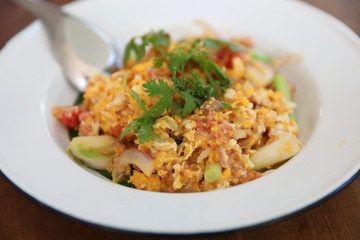 Fototapeta na wymiar North Thai food Fried fermented sour pork and egg on wooden table