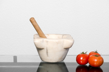 Mortar with tomatoes
