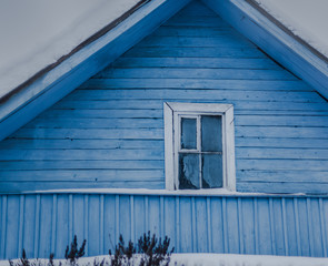 bleu rustic house in country in winter