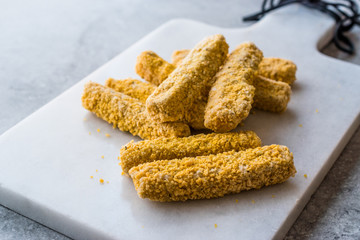 Raw Frozen Breaded Mozzarella Cheese Sticks Ready to Fry in Pan