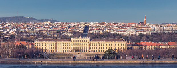 Fototapeta na wymiar Panoramo shot of Schönbrunn Palace and cityscape of Vienna