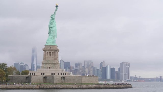 4k view of Statue of Liberty and Manhattan in the background, New York , USA