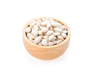 White beans in wood bowl isolated on white background