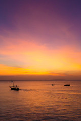Naklejka na ściany i meble Sunset on ocean in Zanzibar