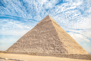 .View of the incredibly majestic pyramid of the cheops on a sunny day in the desert