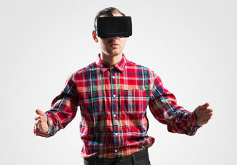 Guy in mask experiencing virtual reality as new entertainment device