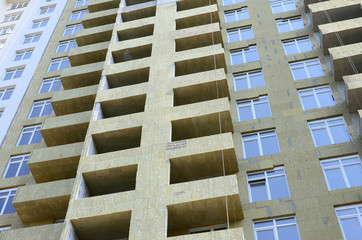 Residential multi store apartement building house facade under construction