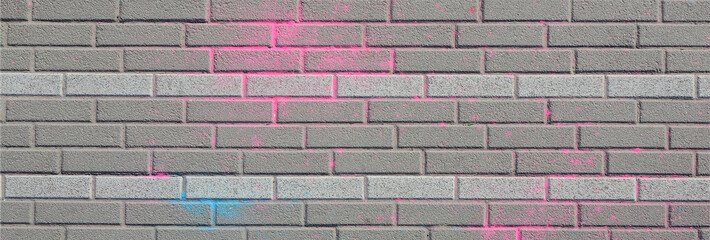 Multi colored paving slabs, powder coated with dry colors at the Holi festival