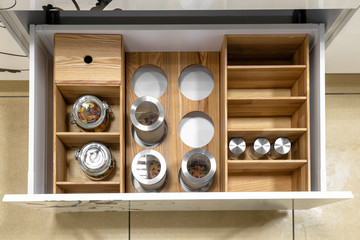 Opened kitchen drawer , a smart solution for kitchen storage and organizing