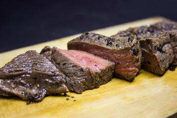 Medium Roast Steak on wooden plate 