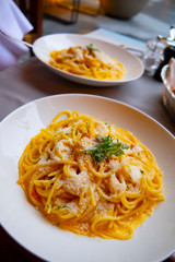 Two Plates with Carbonara Spaghetti in Italy.