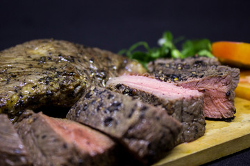 Medium Roast Steak on wooden plate 