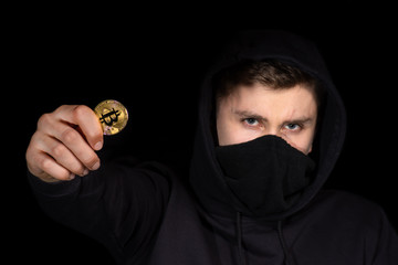 Closeup hacker hold bitcoin in hand initiating cyber attack, concept cyber security, isolated on...