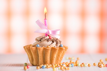 Delicious cake with cream and candles. Holiday Card Background
