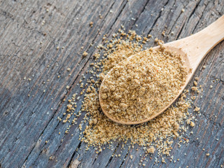 Asian spices. Svan salt in spoon on wooden background. Closeup