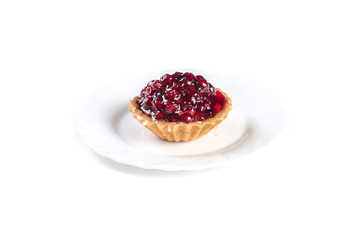 cowberry jelly cake on a white plate isolated on white background