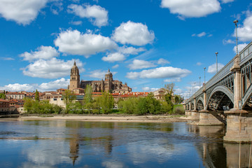 Fototapeta na wymiar iron bridge and Salamanca Cathedral in Salamanca, Spain