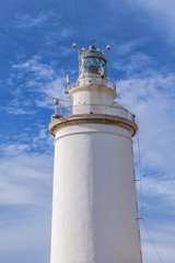 Lighthouse "La Farola de Malaga" in Malaga city. Andalusia, Costa del sol, Spain.