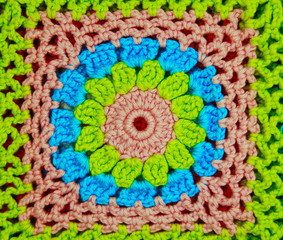 crocheted multicolored flowers background