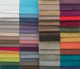 Fototapeta premium Colorful upholstery fabric samples in store