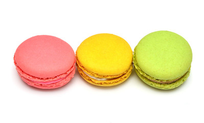 Beautiful macaroons multicolored isolated on white background. French confection
