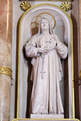 St. Margaret statue on the main altar in Basilica of the Sacred Heart of Jesus in Zagreb, Croatia 