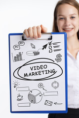 Business, technology, internet and networking concept. Young entrepreneur showing keyword: Video...