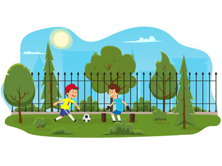 two boys play football in the park among the trees.