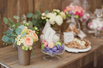 candy bar with sweets and flowers