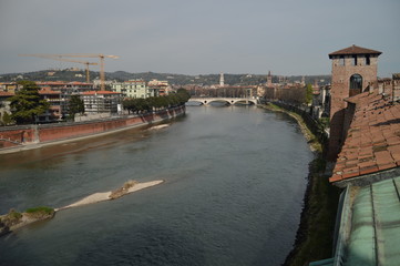 Adige River Seen From Inside The Walls Of Castelvecchio Castle In Verona. Travel, holidays, architecture. March 30, 2015. Verona, Veneto region, Italy.