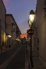 road at sunset with road signal