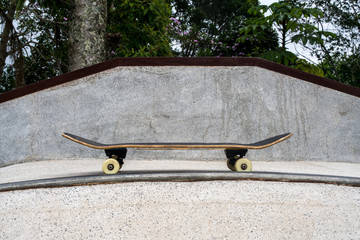 skateboard over the ramp with a rail and an edge