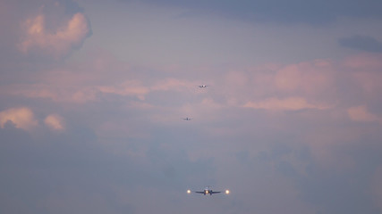 Fototapeta na wymiar Airplanes lined up for landing