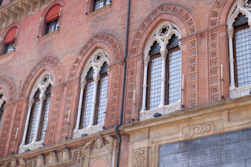 Fototapeta na wymiar Windows, Palazzo Comunale Palace Building - City Hall in Bologna, Italy