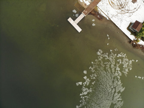 Frozen Lake in Vergiate Italy with pier