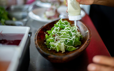 chef preparing salad