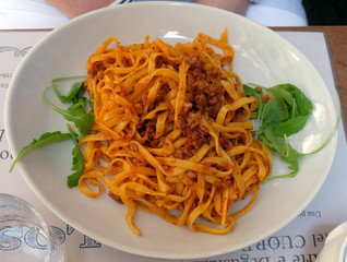 A classic traditional Italian dish, ragu all bolognese, with tagliatelle in Bologna, Italy