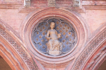 Obraz premium Lady Justice, Medieval palace of the merchandise or loggia of the merchants in Bologna, Italy