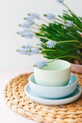 Set of ceramic pastel dishware on table