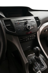 Fototapeta na wymiar Panel of modern car. Auto interior detail. Vertical photo.