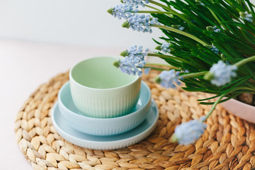 Set of ceramic pastel dishware on table