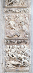 Isaac blesses Jacob by Ercole Seccadenari up and Burial of Jacob's wife by Amico Aspertini, left door of San Petronio Basilica in Bologna, Italy
